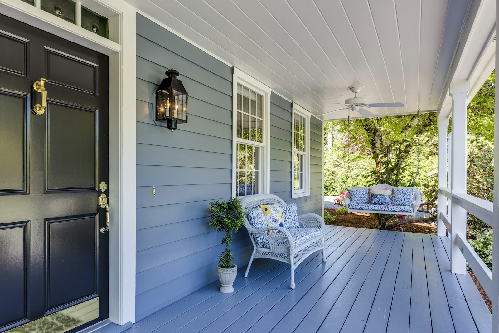 A welcoming front porch with a swing